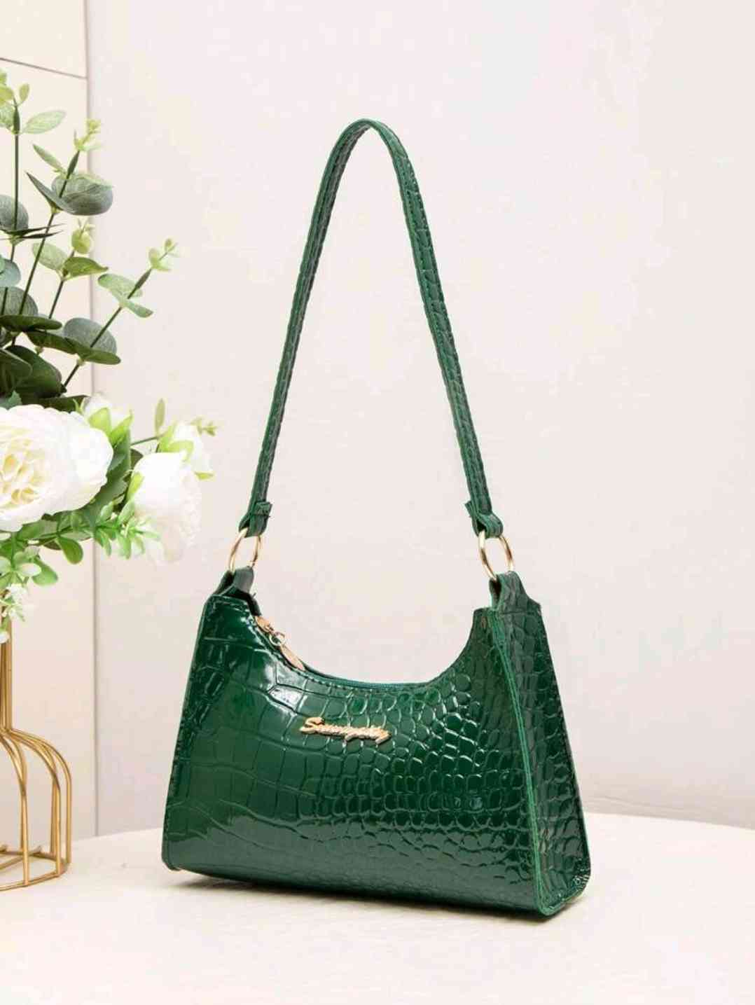 Women's fashionable shoulder bag with crocodile embossing and zip fastening, crescent-shaped women's bag