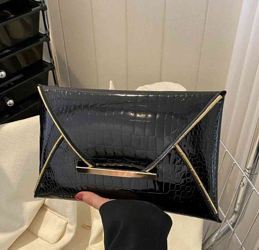 Envelope bag with crocodile embossing, contrasting hem