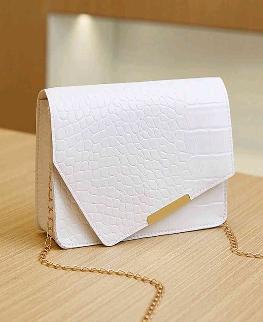 Fashionable women's shoulder bag with chain, small handbag with embossed crocodile look