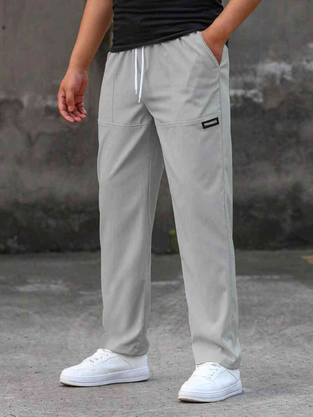 Manfinity Homme Men's Casual Trousers with letter patches, Drawstring waist, slim leg, long, slim light grey fabric trousers