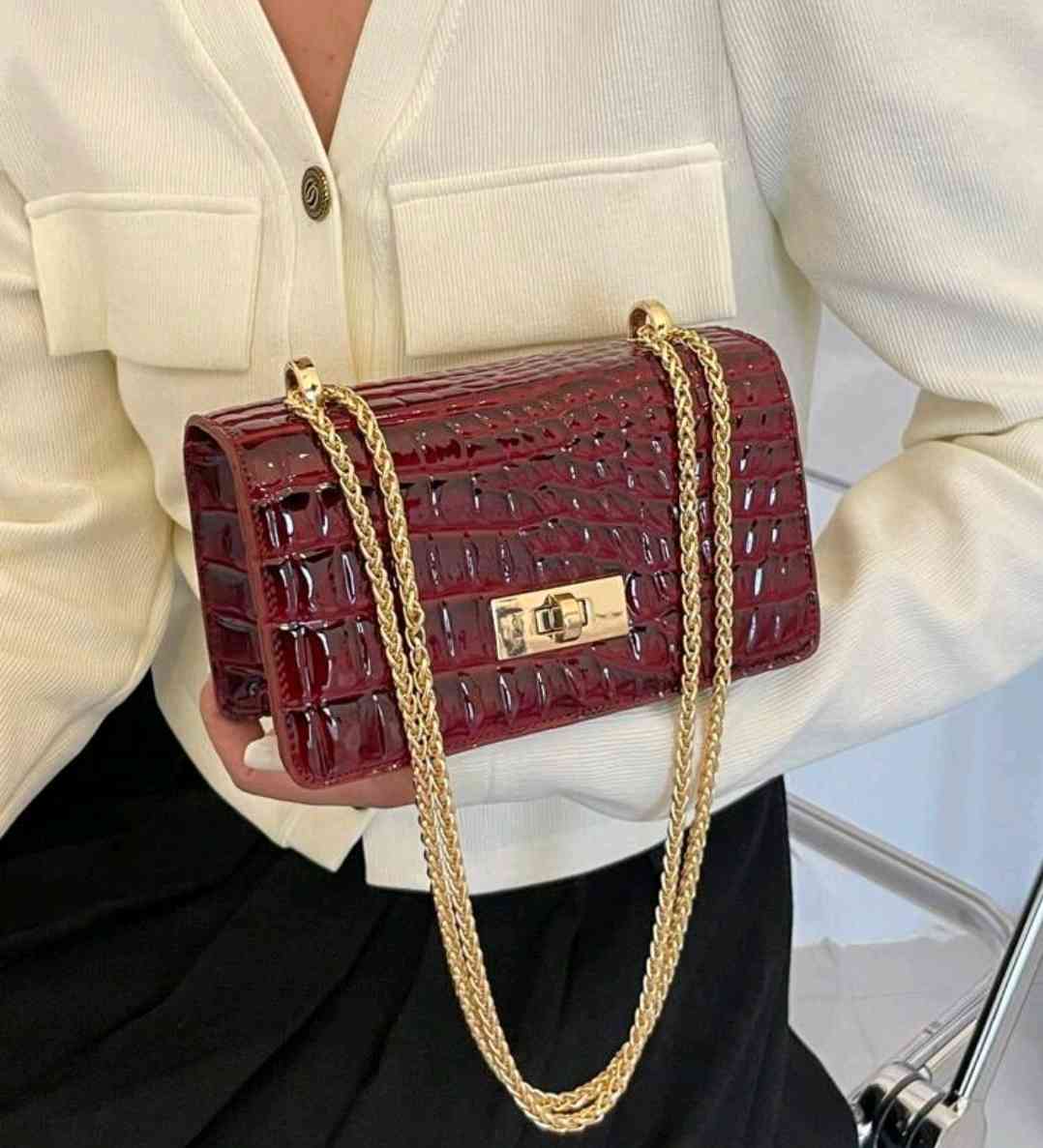 Burgundy mini shoulder bag made of faux leather with crocodile embossing for women